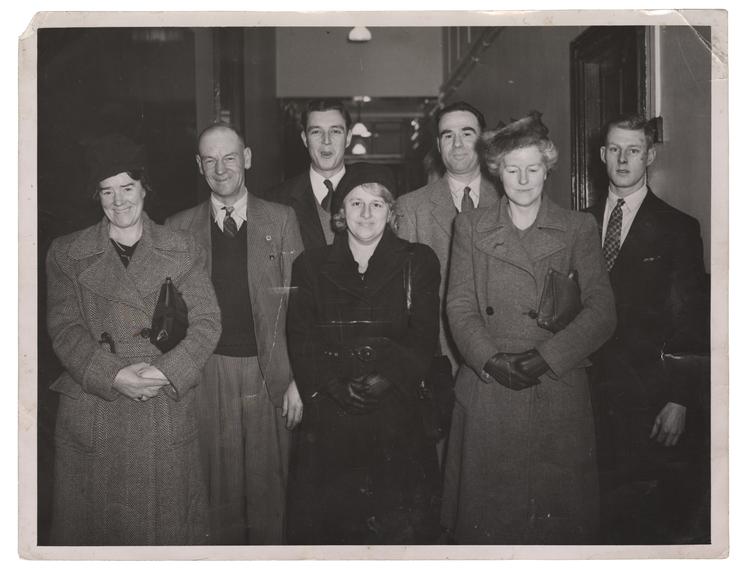 F. Smart, W. Thorburn, D. Westland and A. Chandler with family members