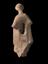 Hollow earthenware votive(?) figure of standing woman, with hat