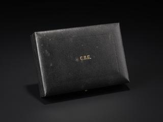 Black presentation box inscribed 'C.B.E.', awarded to Patrick Moore