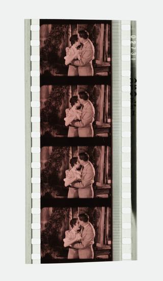 Four frames of 35mm Sonochrome tinted sound positive film