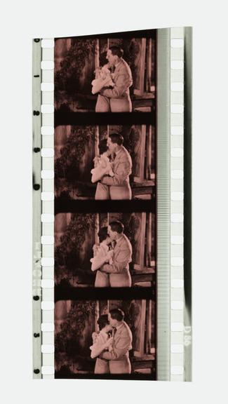 Four frames of 35mm Sonochrome tinted sound positive film with