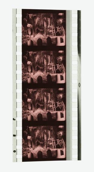 Five frames of 35mm Sonochrome tinted sound positive film with