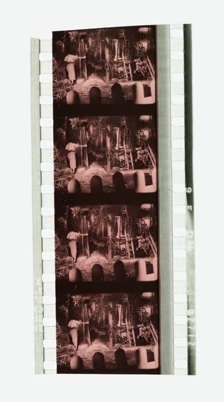 Four frames of 35mm Sonochrome tinted sound positive film with