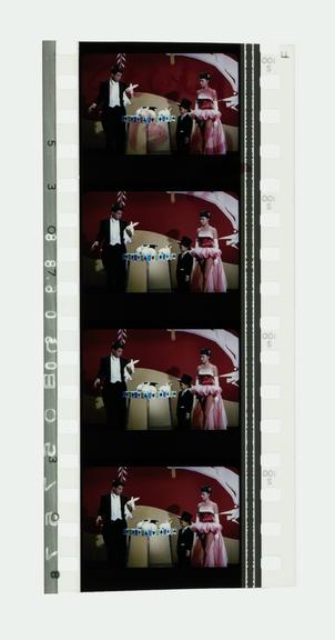 Four frames of 35mm positive Technicolor film with a variable