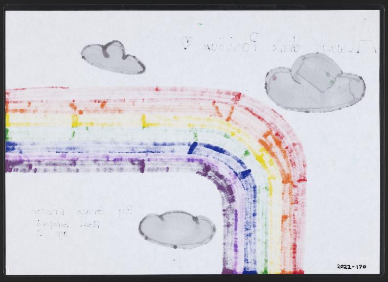 A4 laminated image of a rainbow and clouds including the words