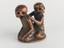 Wooden netsuke, in the form of two seated skeletons