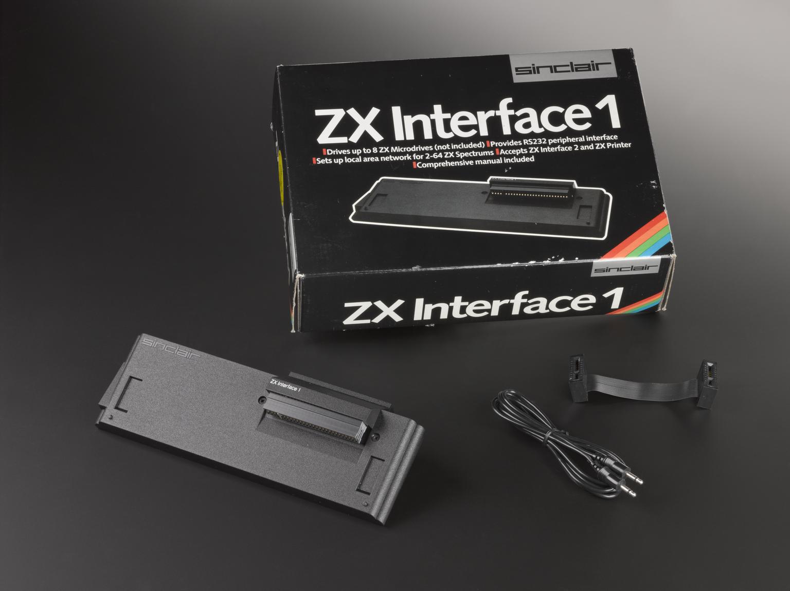 Sinclair ZX interface 1 (serial no. D1-02-042954) and connecting leads ...