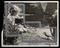 Photograph of a girl photographing  a bird