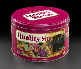 Pinhole camera made from Quality Street tin