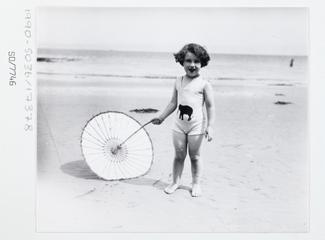 Photograph of a child on the beach