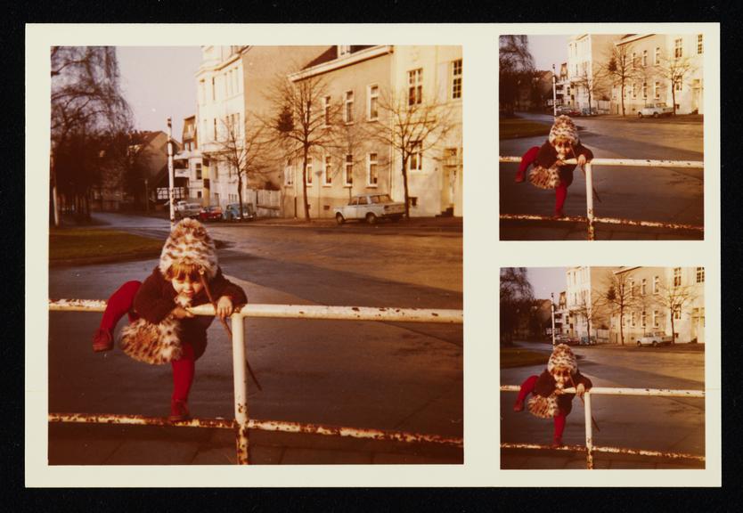 "Tri-print" snapshot photograph of a child climbing over a railing
