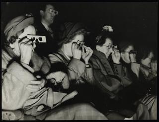 Cinema audience watching a three dimensional film