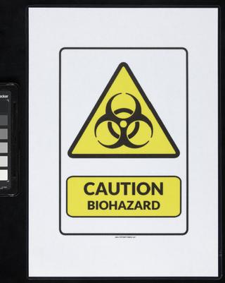 Caution sign from a sample preparation area of a COVID-19 testing centre