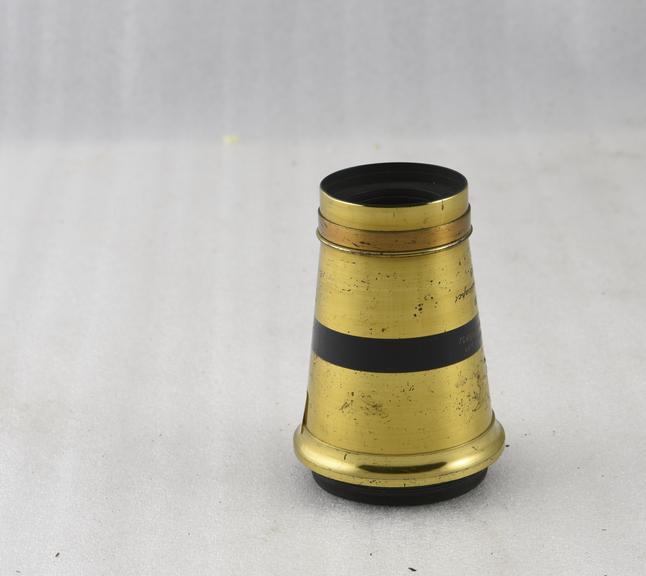 Brass mounted lens