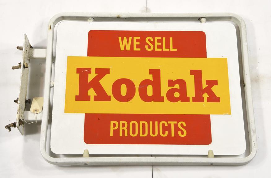 Hanging Advertisement Sign 'We Sell Kodak Products'