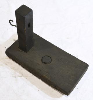 Board with End of Wooden Clamping Screw and Post with Hook.