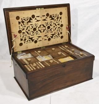 Collection of stereoscopic photographs in cabinet