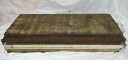 Marble cutting block on wood base