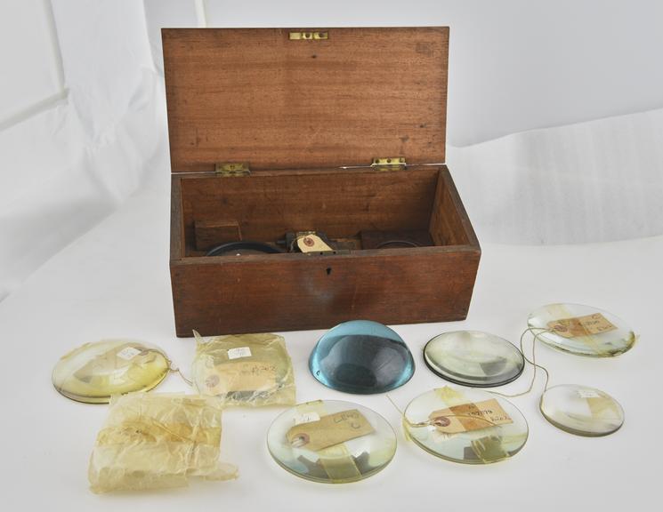 Large wooden box of lens