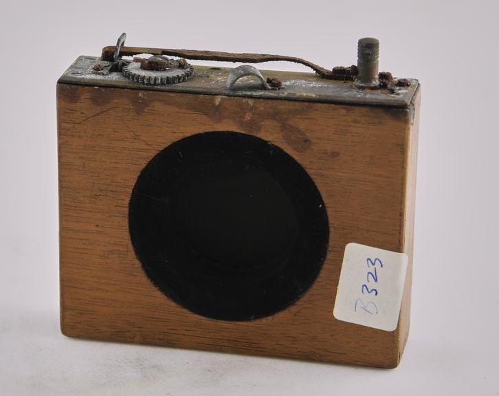 Early type of camera shutter.