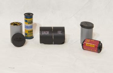 Collection of film spools and canisters: Kodak Plus-X safety film