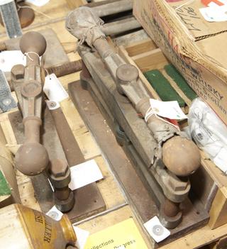 Two iron fly presses
