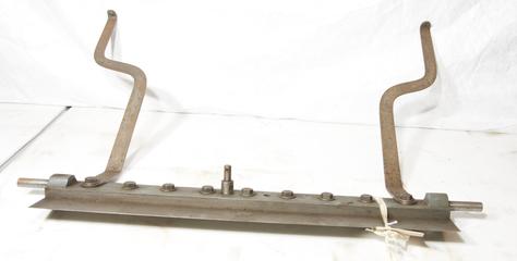 Rectangular part with rivets and two brackets