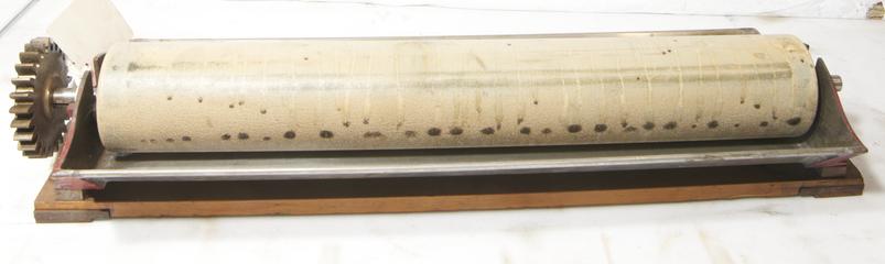 Roller and metal piece