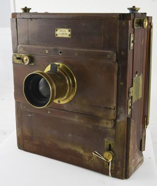 'Ross' folding bellows field or stand camera for negatives 6 1/2 x 8 1/2. Double extension