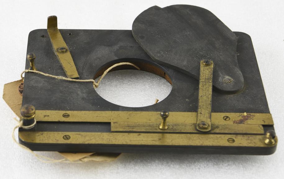 Early type of camera shutter.