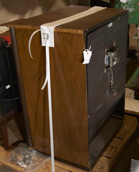 Television Set in Wood Cupboard