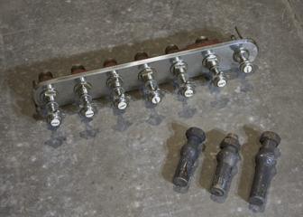 Victorian bath with hooded spray and seven taps, c