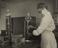 A woman tests samples of milk in a laboratory