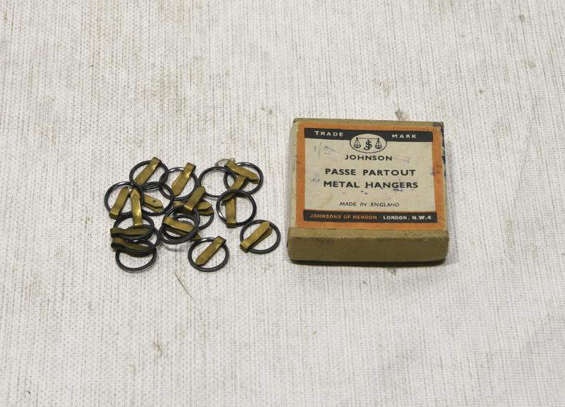 Box of Johnson Partour Metal Hangers