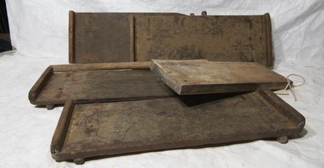 Five wooden boards and one wooden roller likely associated with various roller covering machinery