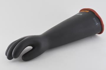 One of a pair of high voltage rubber gloves