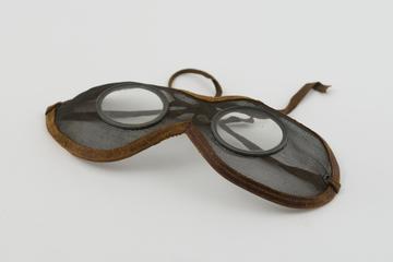 Pair of grinders goggles in wire mesh with glass disc lenses