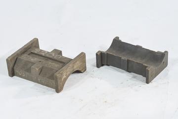 Two under-keep tray patterns for locomotive components