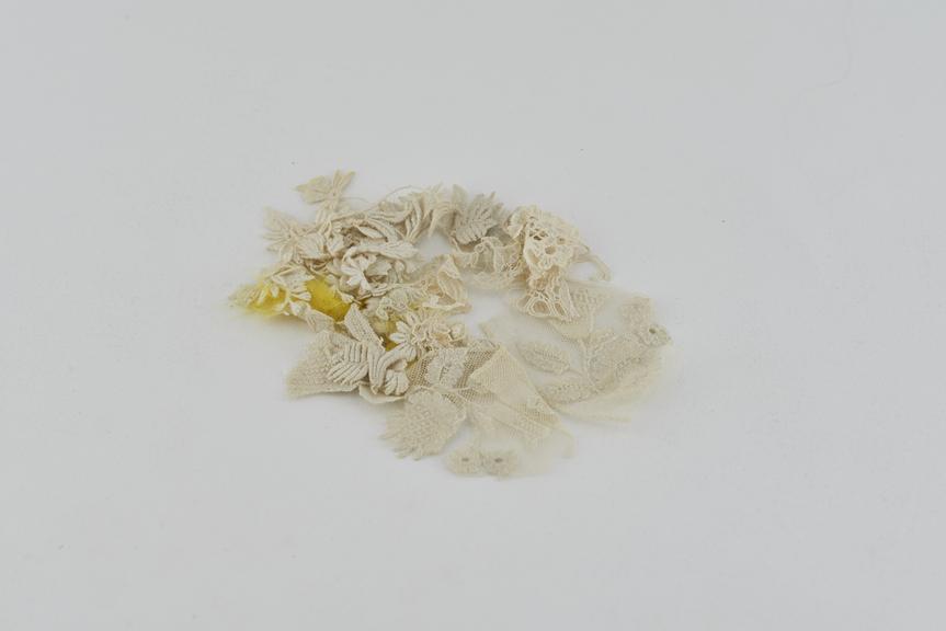 Some pieces of Brussels type lace mesh and applique