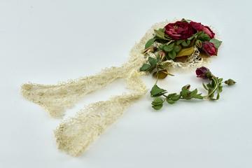 Cream lace headdress with streamers