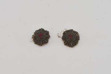 Pair of Metal Shoulder Badges with Red Cross Stitched in Centre.