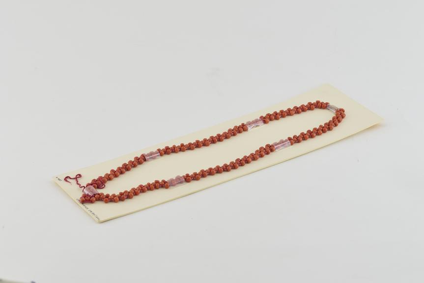 Necklace of Looped Strands of Pink Coral Beads.