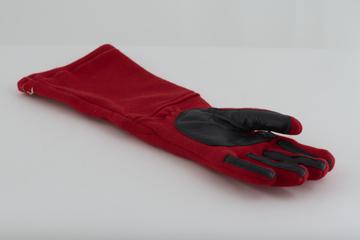 One of a pair of racing driver's gloves as used by Alan Jones