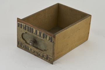 Wooden drawer with 2 painted labels