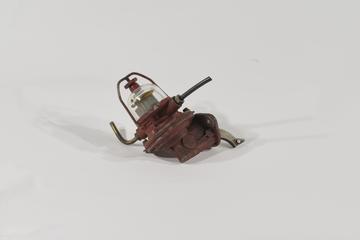 Red valve component from Redrup 1000 Horsepower Aero Engine