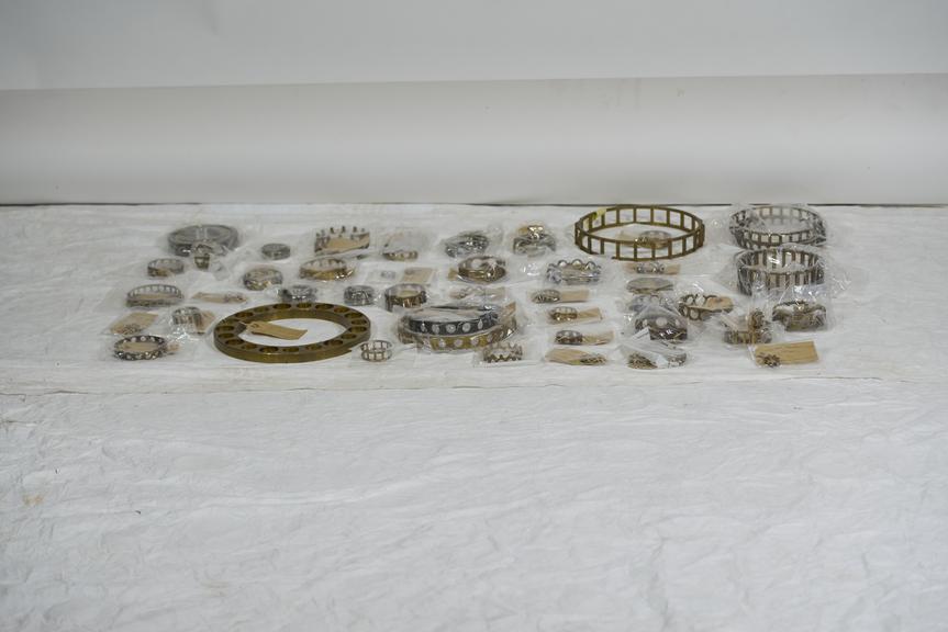 Collection of 6 bearings and 42 cages and 2 paired cages