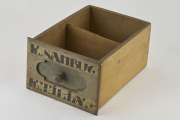 Wooden drawer with 2 painted labels