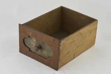 Wooden drawer with labels missing