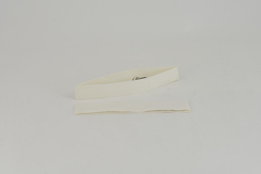 Pair of narrow white folded linen cuffs