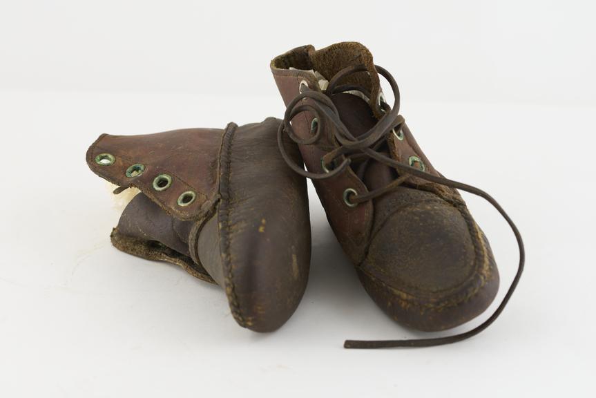 A Pair of Child's Moccasin Style "Canoe" Boots from Eastern Canada.